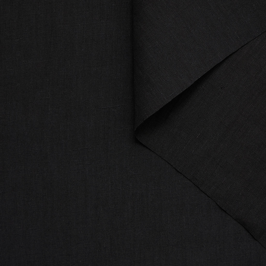 zoom tissu toile de lin lavé noir pour tailleur femme Facettes Studio
