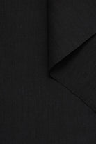 zoom tissu toile de lin lavé noir pour tailleur femme Facettes Studio